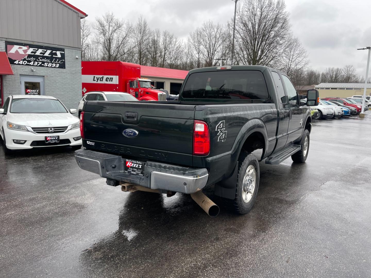 2015 Green /Gray Ford F-250 SD XLT SuperCab Long Bed 4WD (1FT7X2BT6FE) with an 6.7L V8 OHV 16V DIESEL engine, 6-Speed Automatic transmission, located at 547 E. Main St., Orwell, OH, 44076, (440) 437-5893, 41.535435, -80.847855 - Photo#9